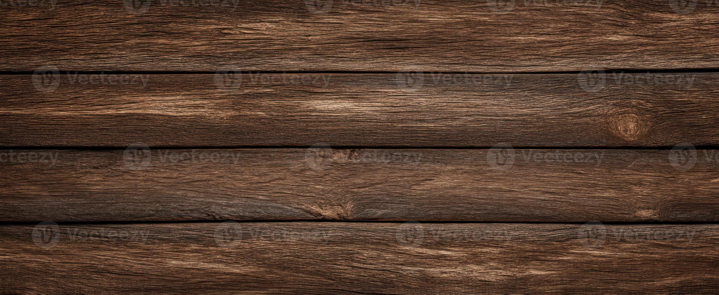 The rustic wooden planks creating a warm and inviting background texture. photo