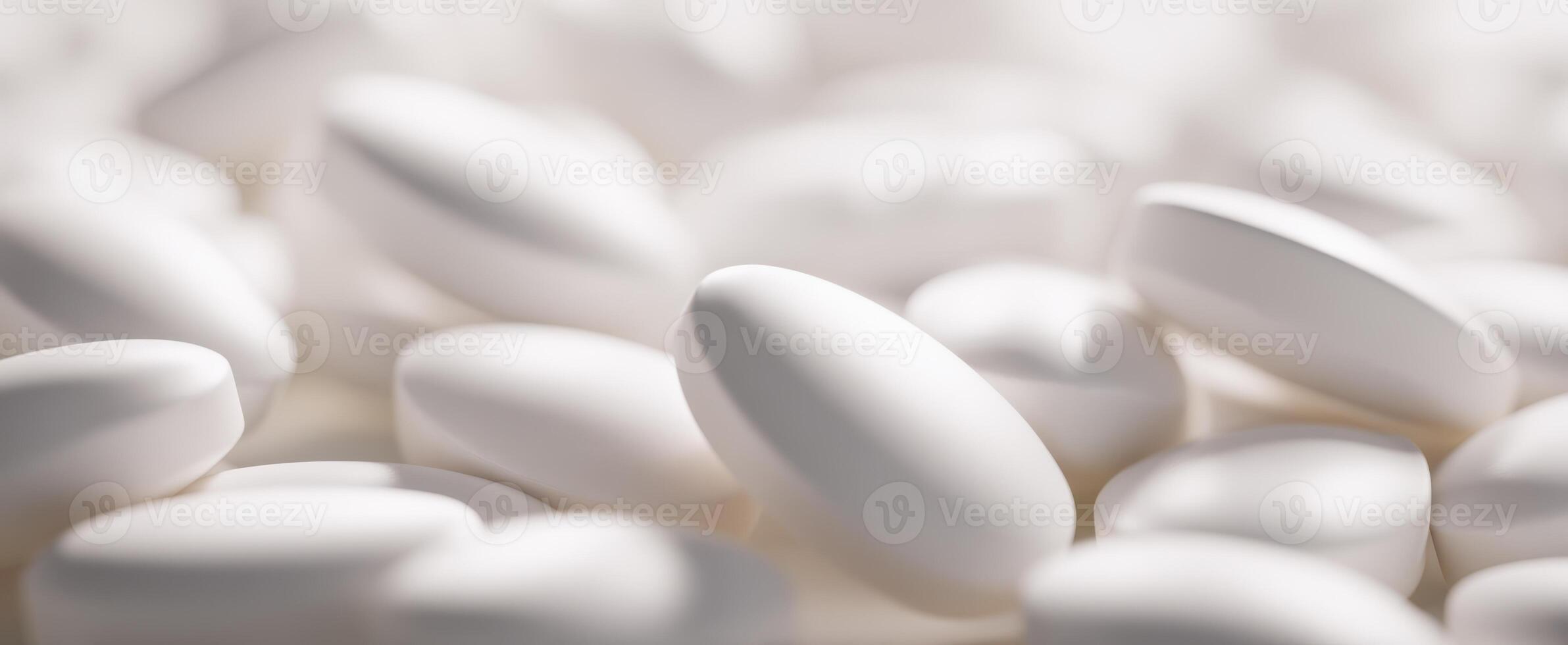The collection of white pills in a soft-focused background. photo