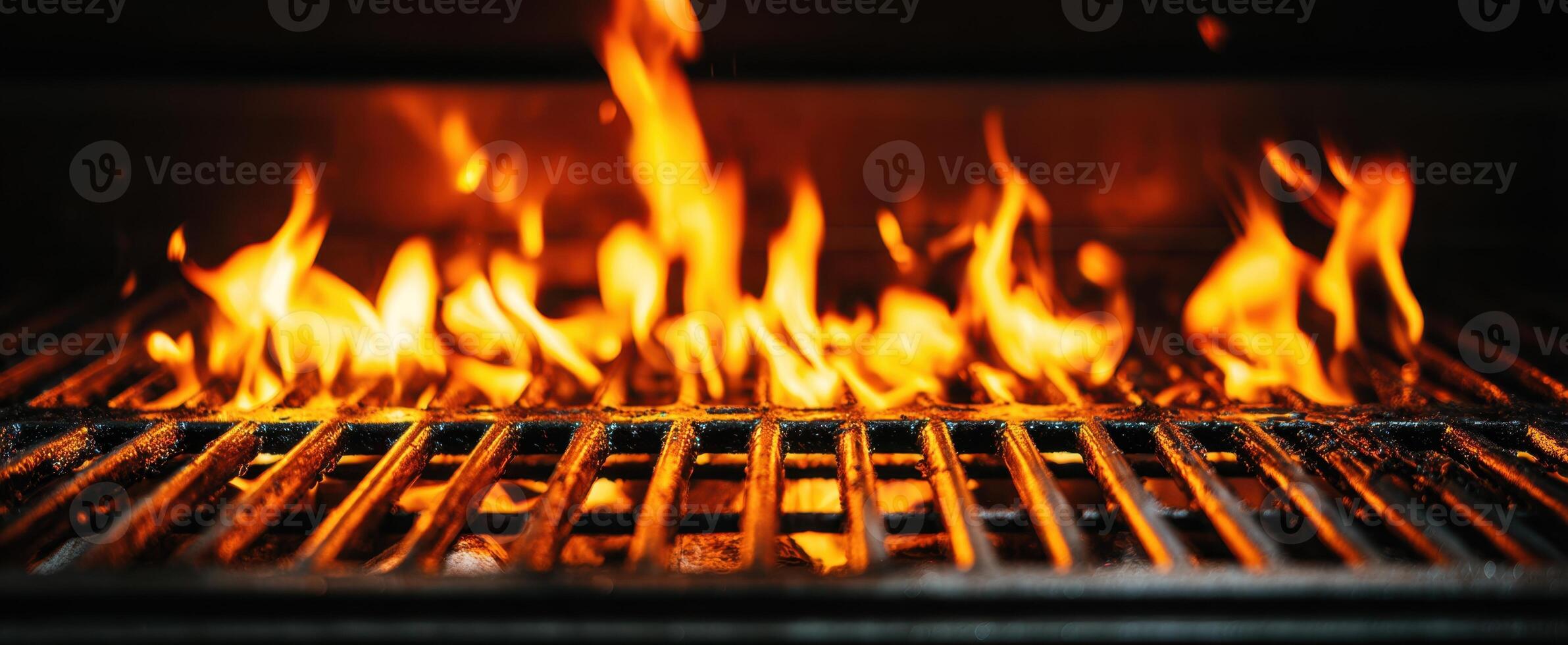 The Flames Dancing on a Grill Ready for Cooking Delicacies photo