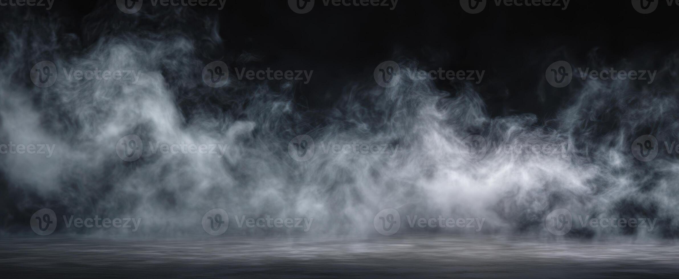 The ethereal beauty of swirling smoke against a dark background. photo