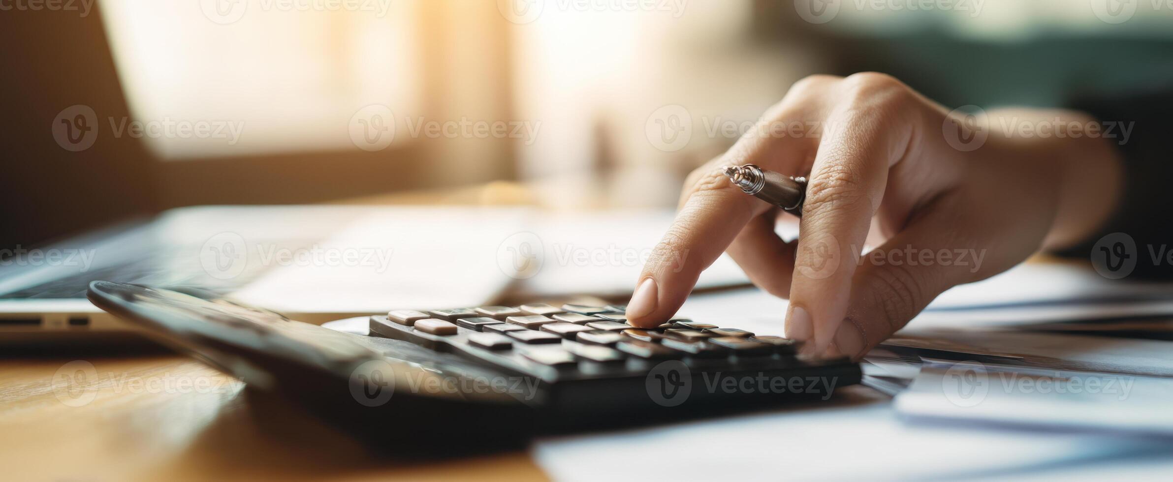 The calculator in use for precise financial calculations and planning. photo