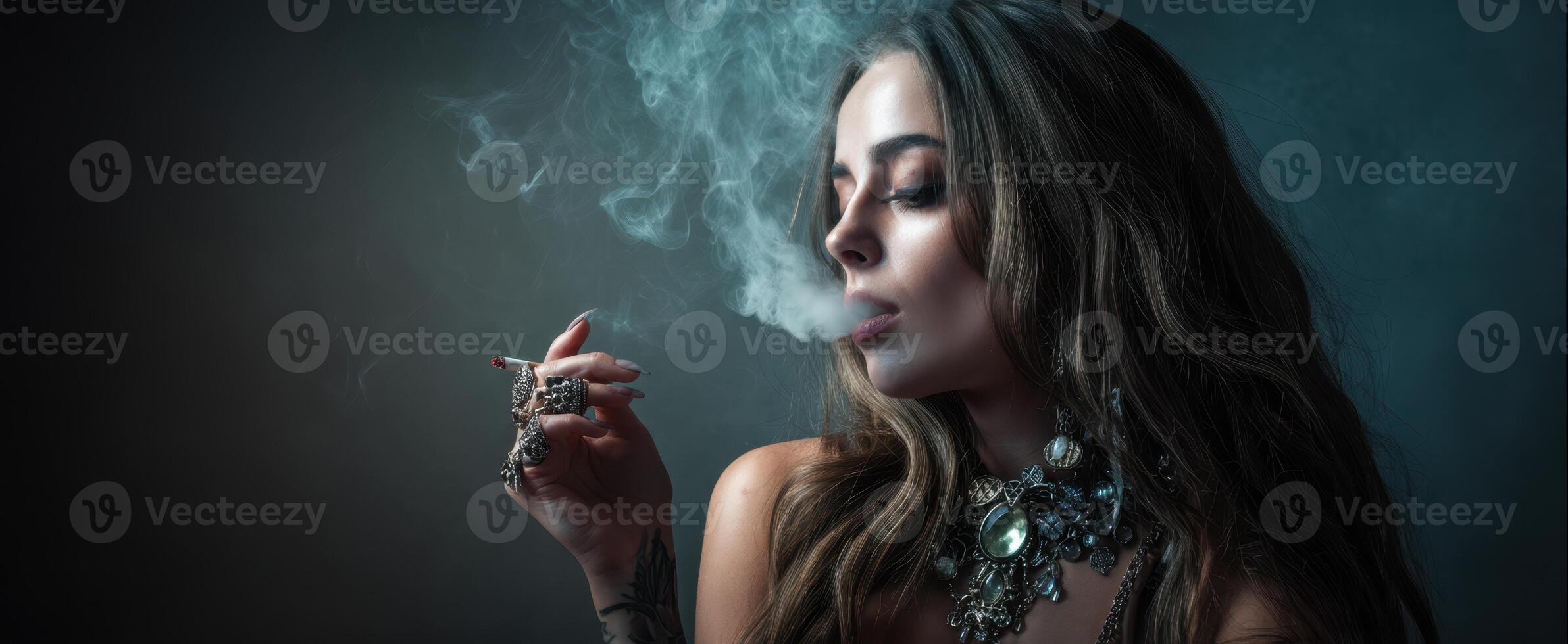 The captivating portrait of a woman exhaling smoke in dramatic lighting. photo