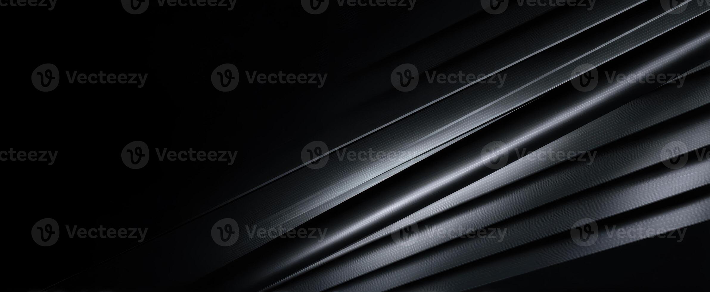 The sleek layers of black create a captivating abstract design. photo