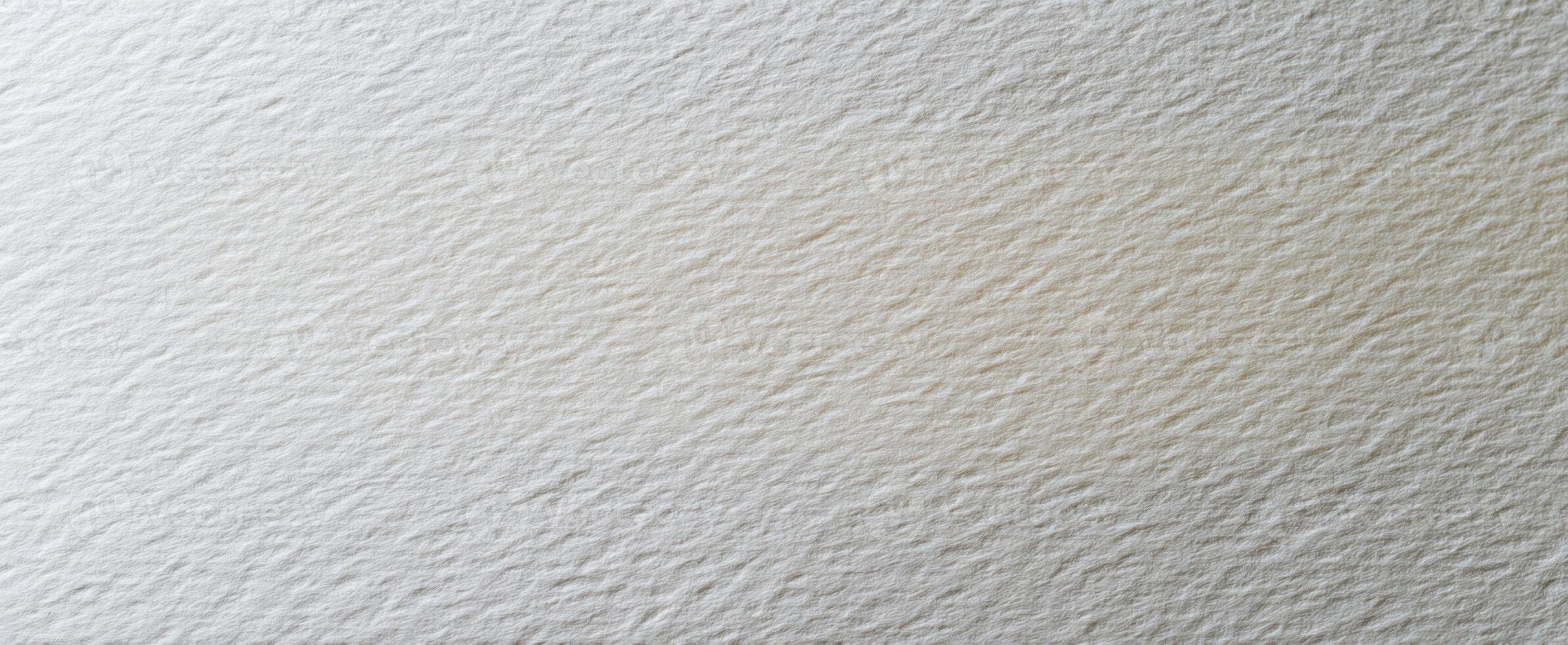 The textured white paper background ideal for creative projects and presentations. photo