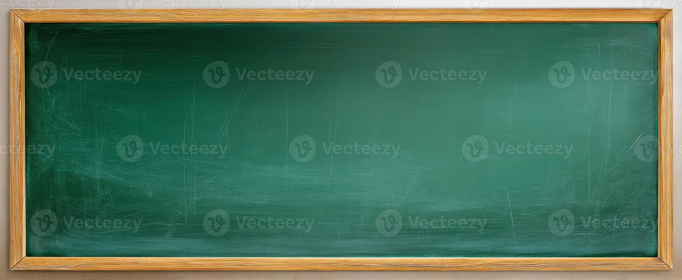 The Empty Green Chalkboard Waiting for Lessons and Ideas. photo