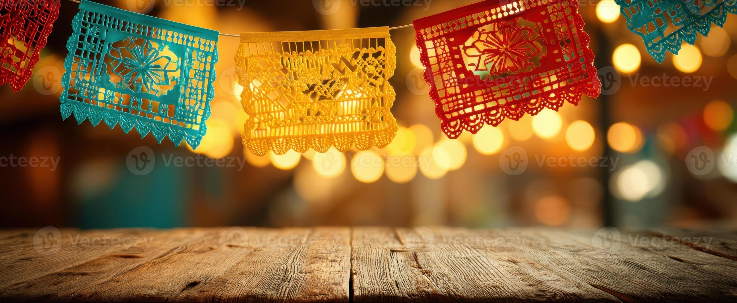 The colorful papel picado banners creating a festive atmosphere in a joyful celebration. photo