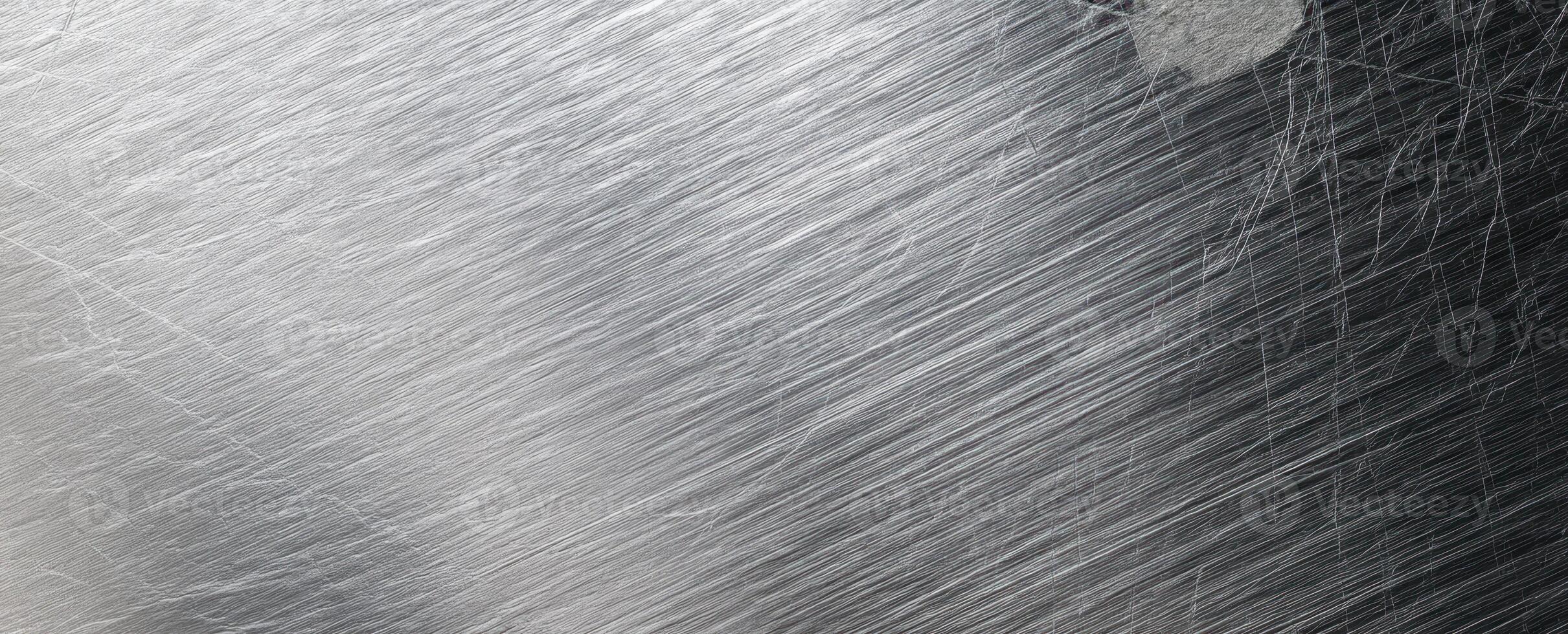 The Gleaming Surface of Brushed Metal Showcasing Textural Depth and Reflection photo