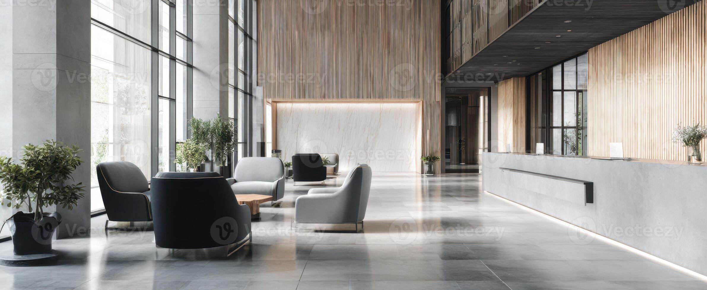 The modern lobby with elegant furniture and large glass windows. photo