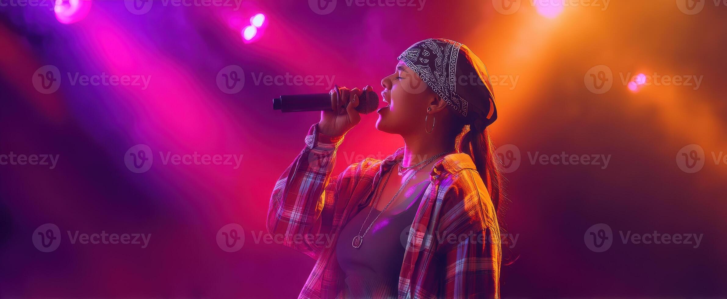 The passionate singer captivating the audience under vibrant stage lights photo