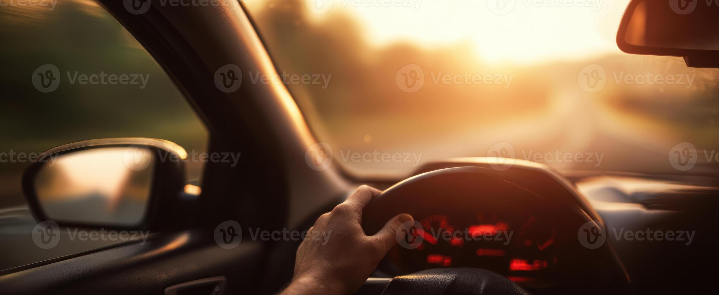 The experience of driving in a car during a beautiful sunset. photo