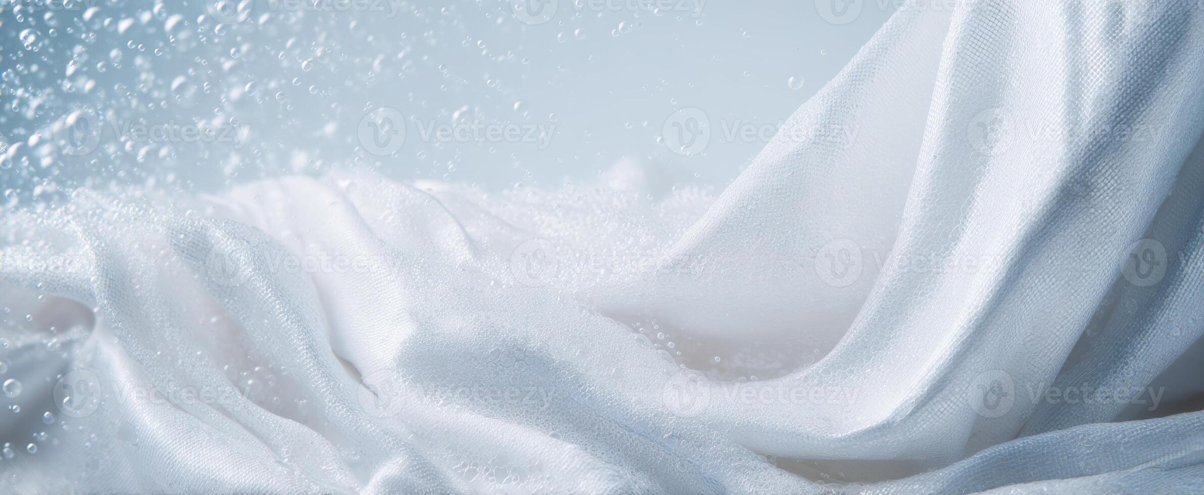 The Softness of Draped White Fabric with Gentle Water Splashes photo