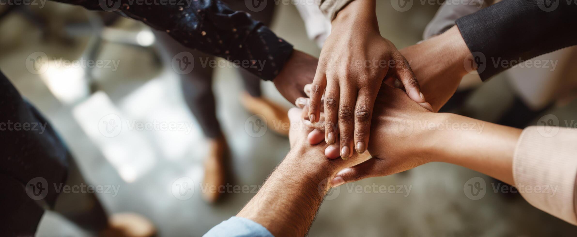 The hands of teamwork coming together in a professional collaborative environment. photo
