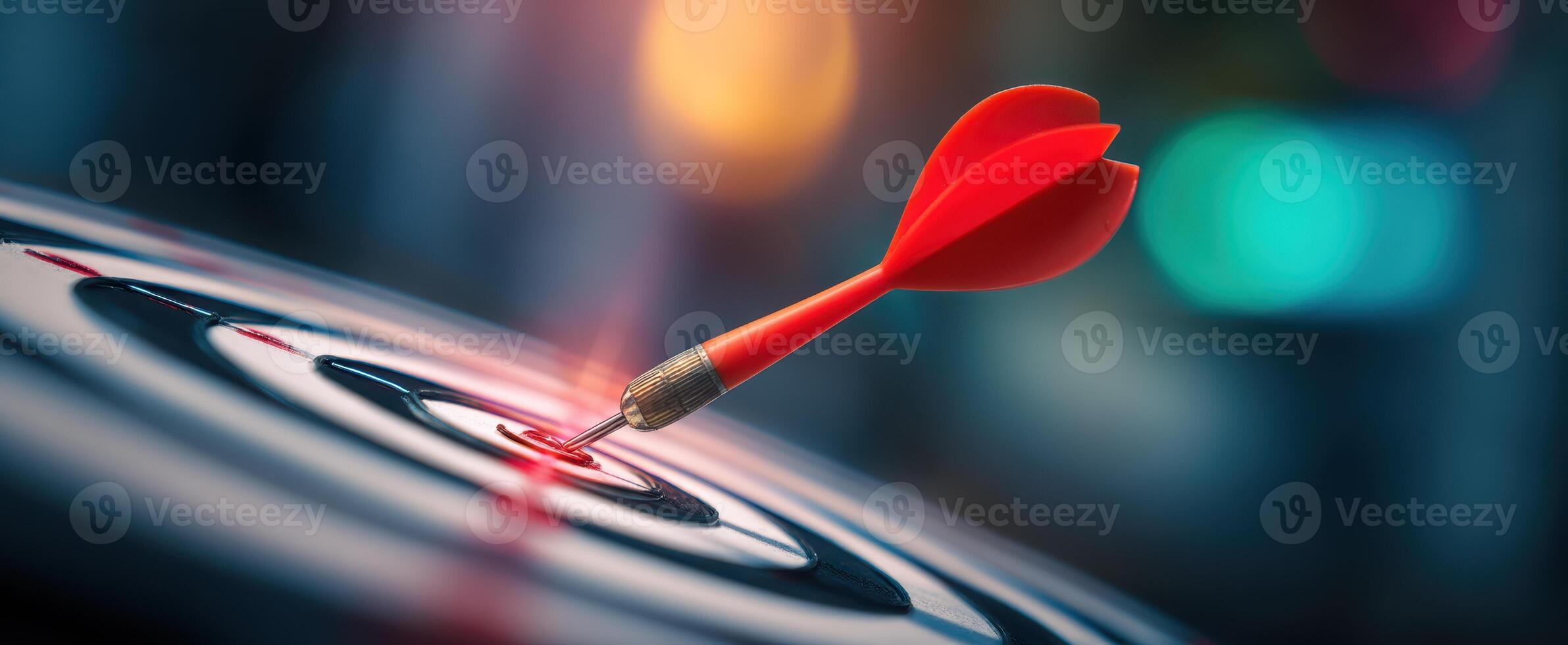 The Red Dart Hitting the Bullseye on a Dartboard with Precision photo