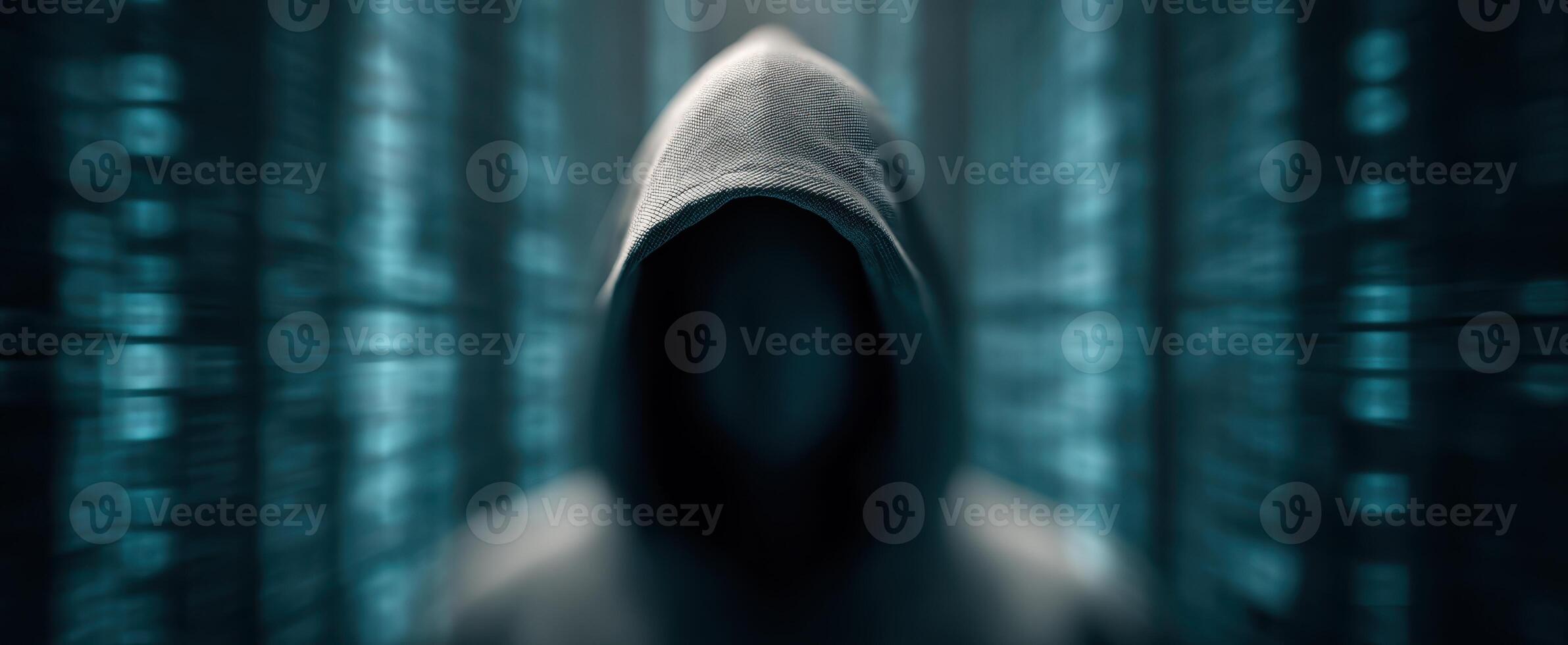 The hooded figure representing anonymity in a digital landscape photo