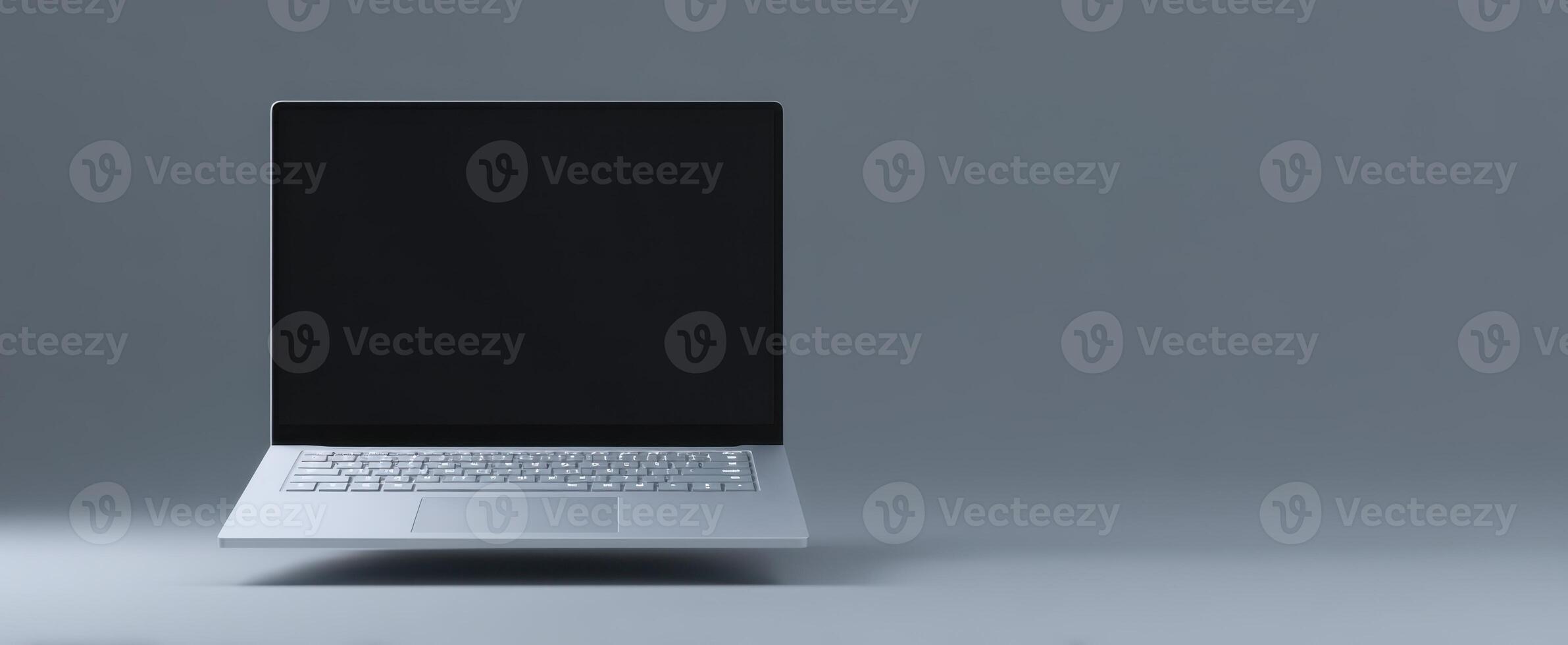 The sleek modern laptop showcasing a blank screen on a minimalist workstation. photo