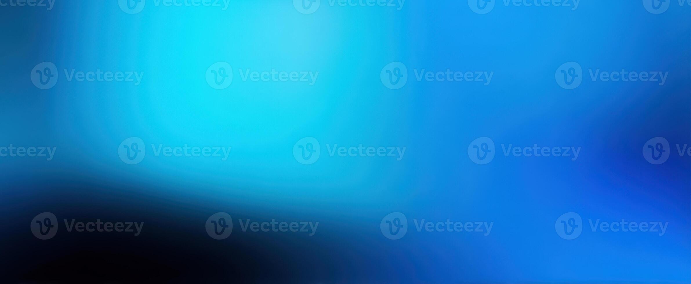 The mesmerizing blue abstract background with soft gradients and light effects. photo