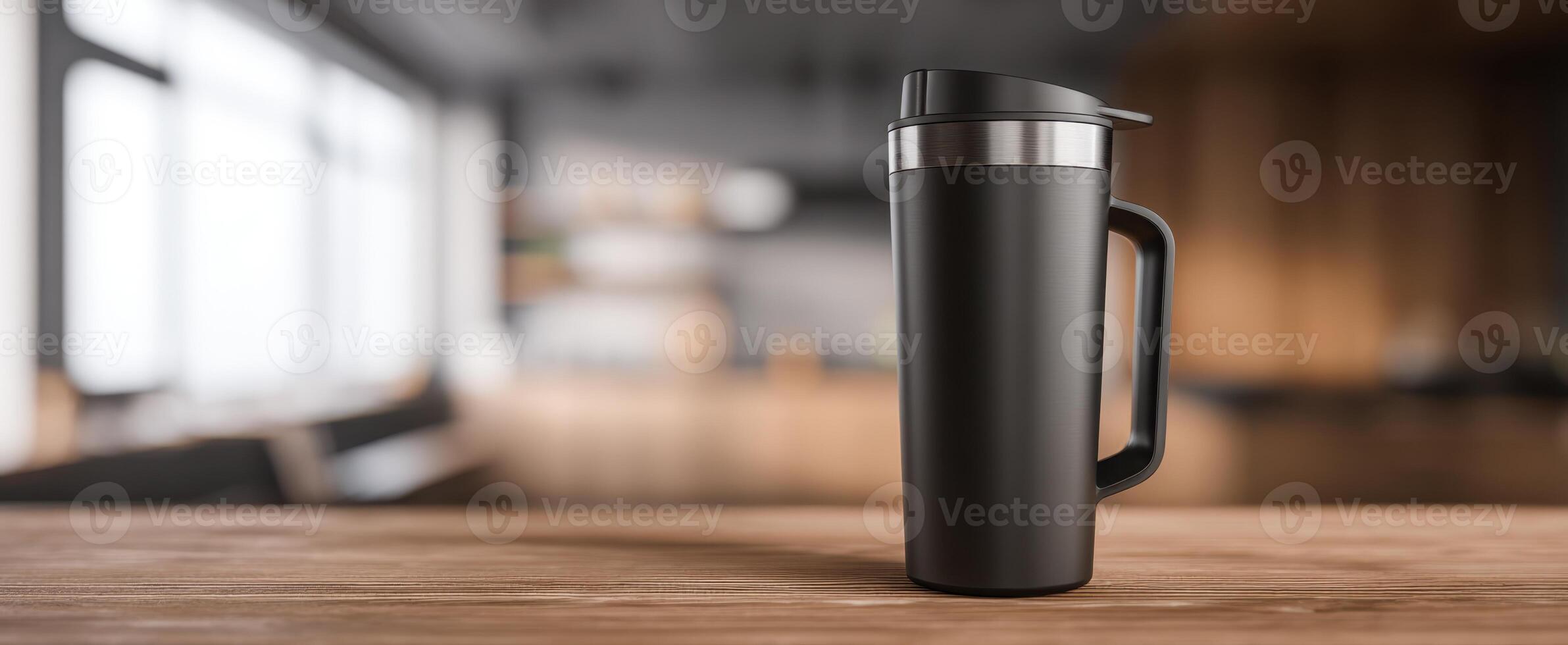 The sleek black mug in a cozy kitchen setting. photo
