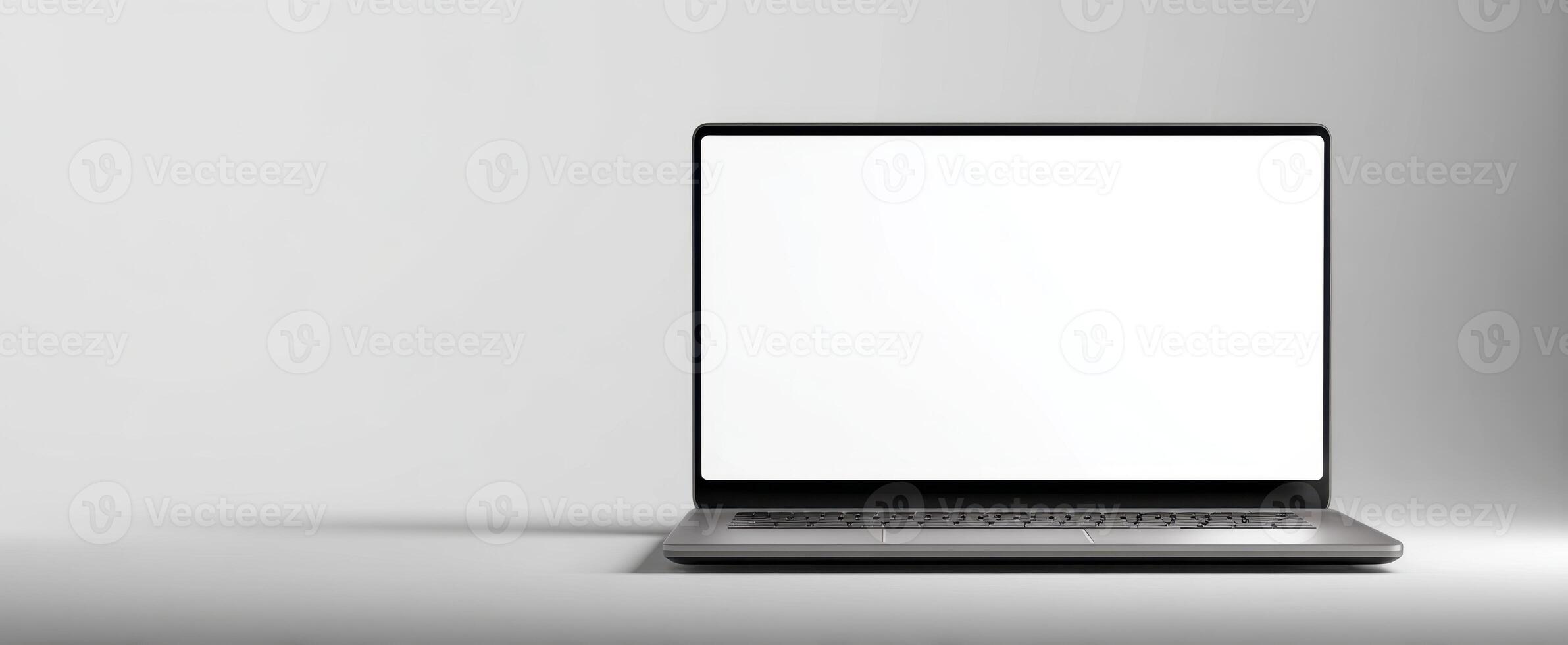 The sleek laptop on a minimalist workspace with a blank screen for creative ideas. photo