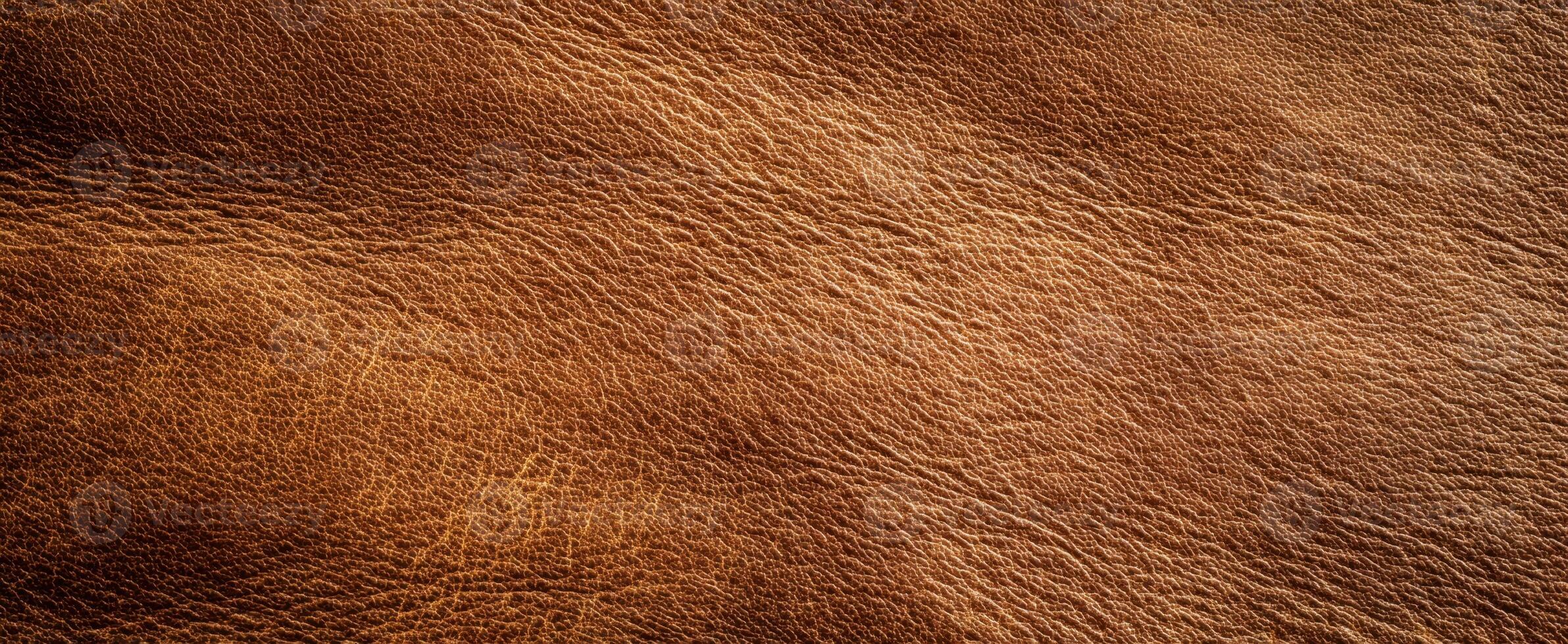 The rich texture of brown leather showcasing its natural beauty and durability. photo