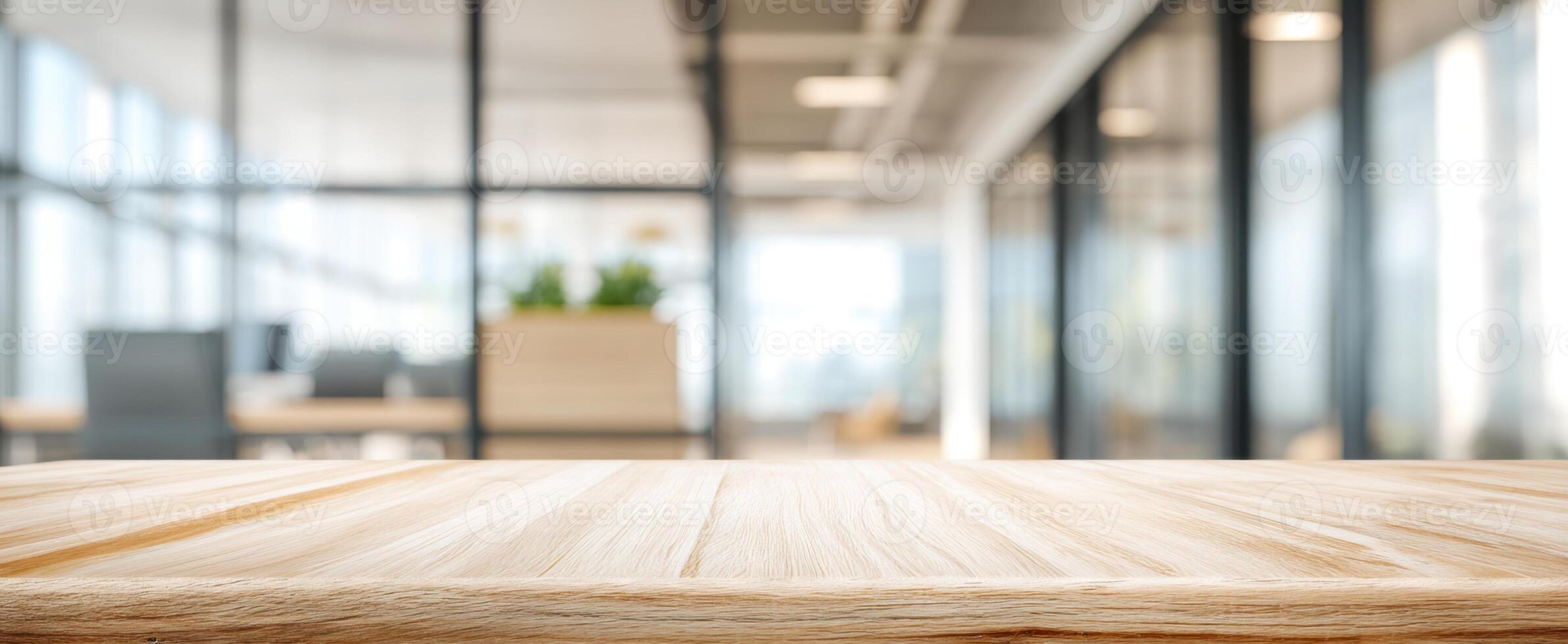 The wooden desk in a modern office space with a bright ambiance. photo