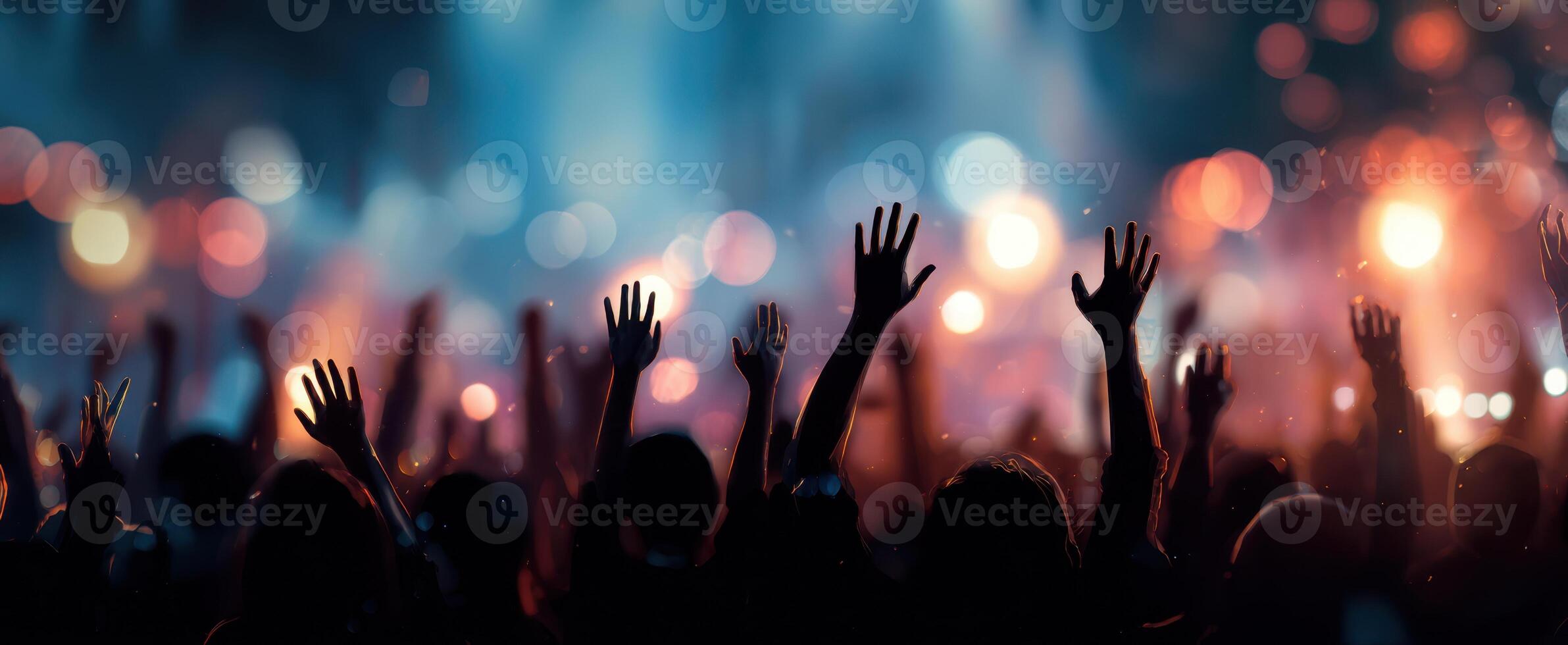 The Energetic Crowd Cheering at a Vibrant Concert Event photo