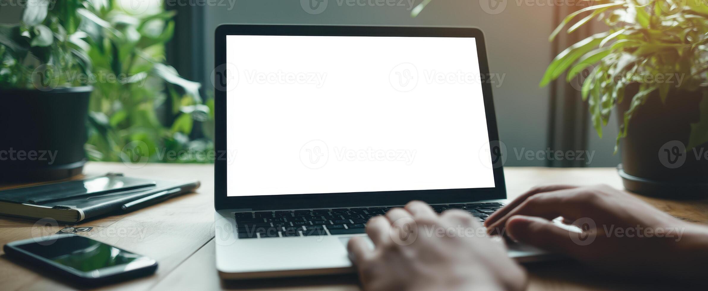The modern laptop setup with a blank screen in a vibrant workspace. photo