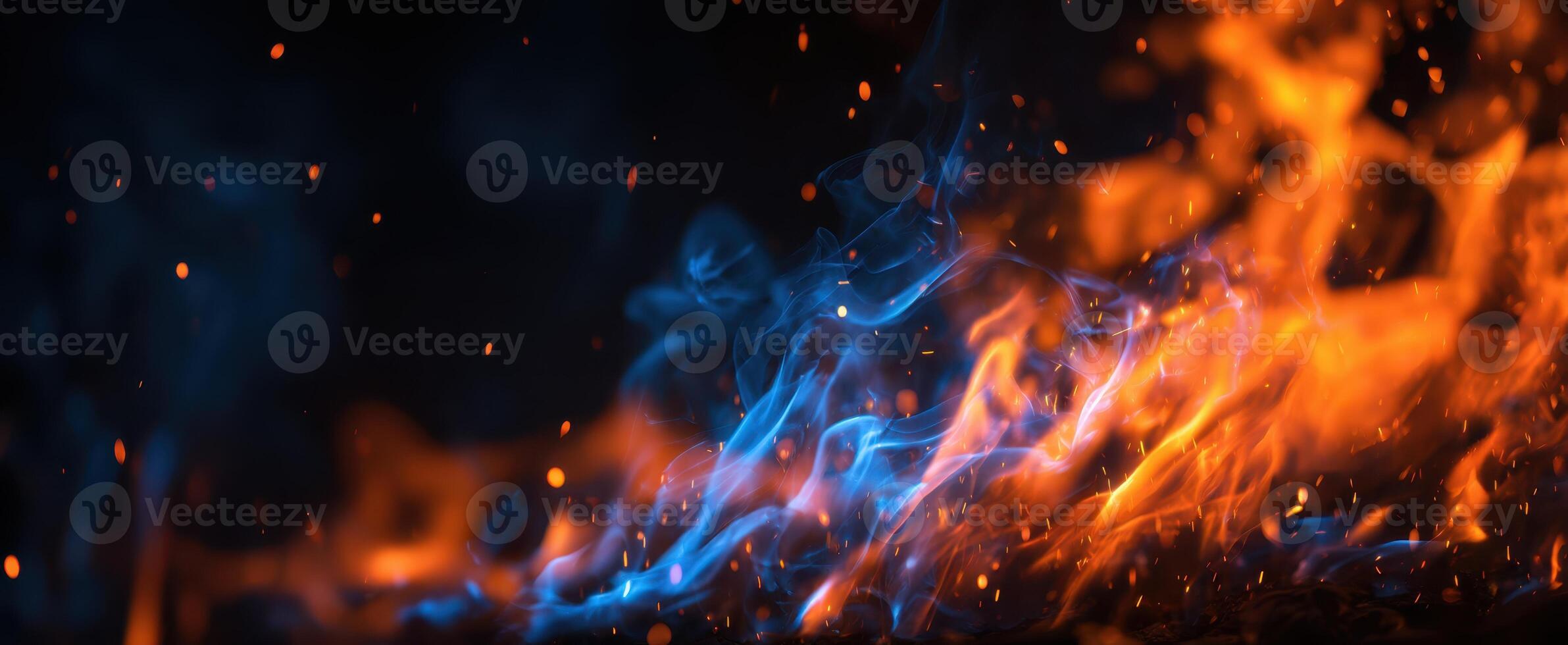 The Flames Dancing in a Colorful Display of Blue and Orange Light photo