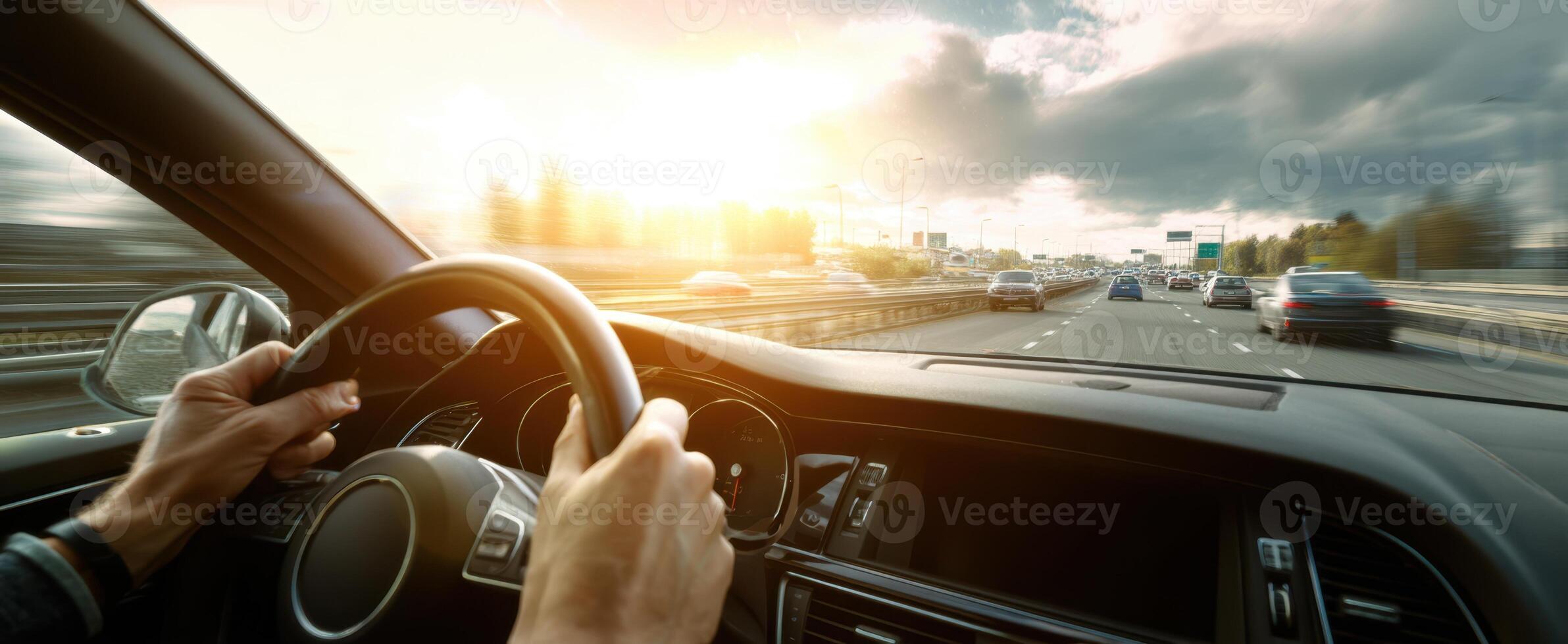 The driver's perspective on a scenic highway at sunset. photo