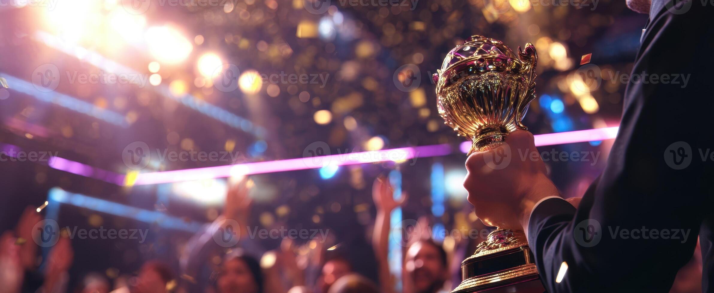 The trophy celebrated amidst cheers and confetti at a glamorous award event. photo
