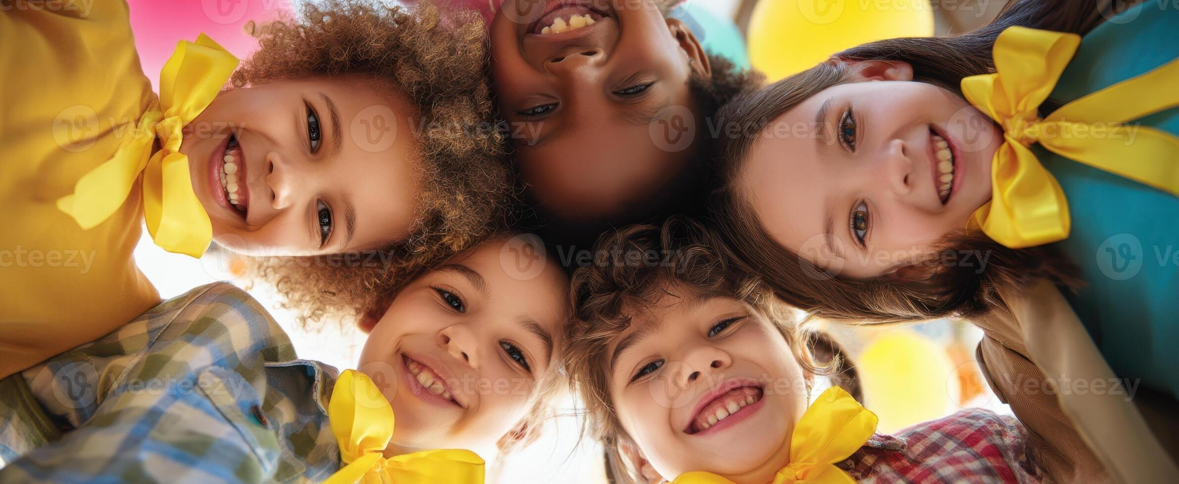 The joyful children celebrating together with bright smiles and colorful bows. photo