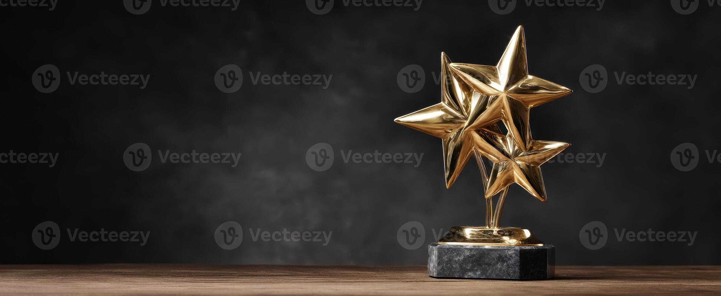 The gold star trophy representing excellence and achievement on a dark background. photo