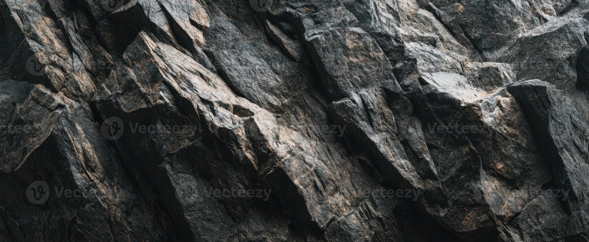 The rugged surface of layered rocks showcasing complex geological formations. photo