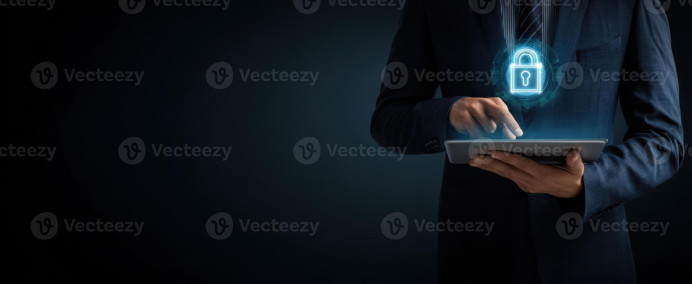 The businessman using a tablet with a digital lock symbol for security. photo