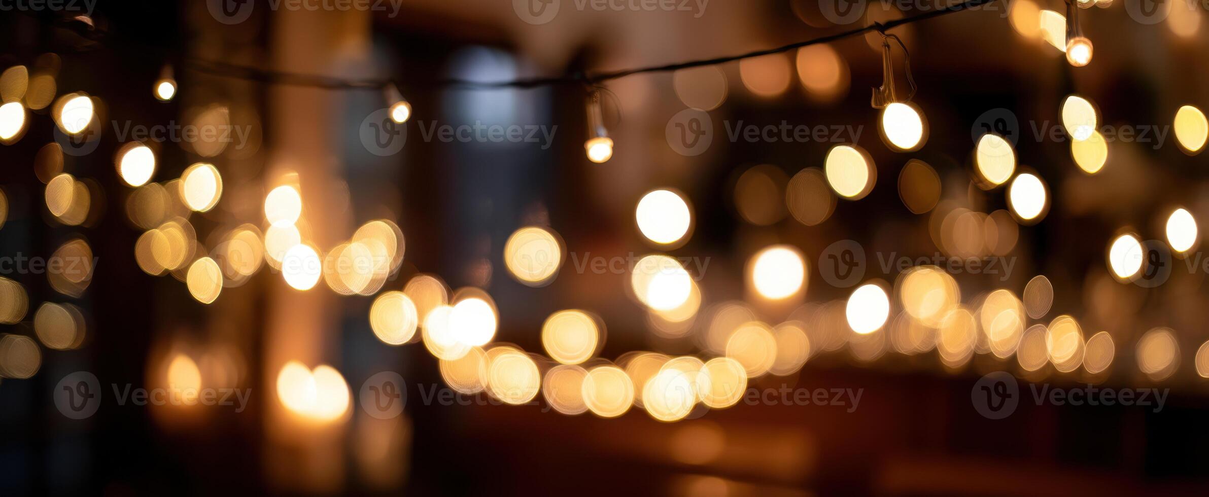 The enchanting glow of string lights creating a warm and festive ambiance. photo