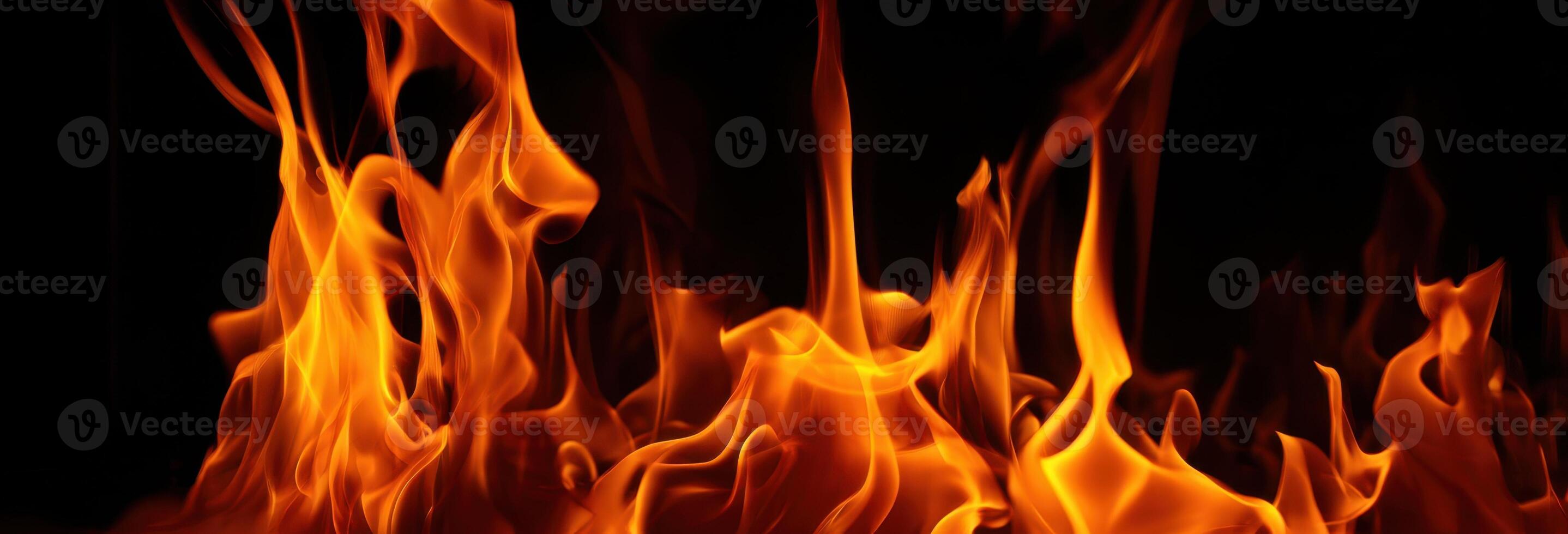 The captivating dance of flames in an intense fiery display. photo