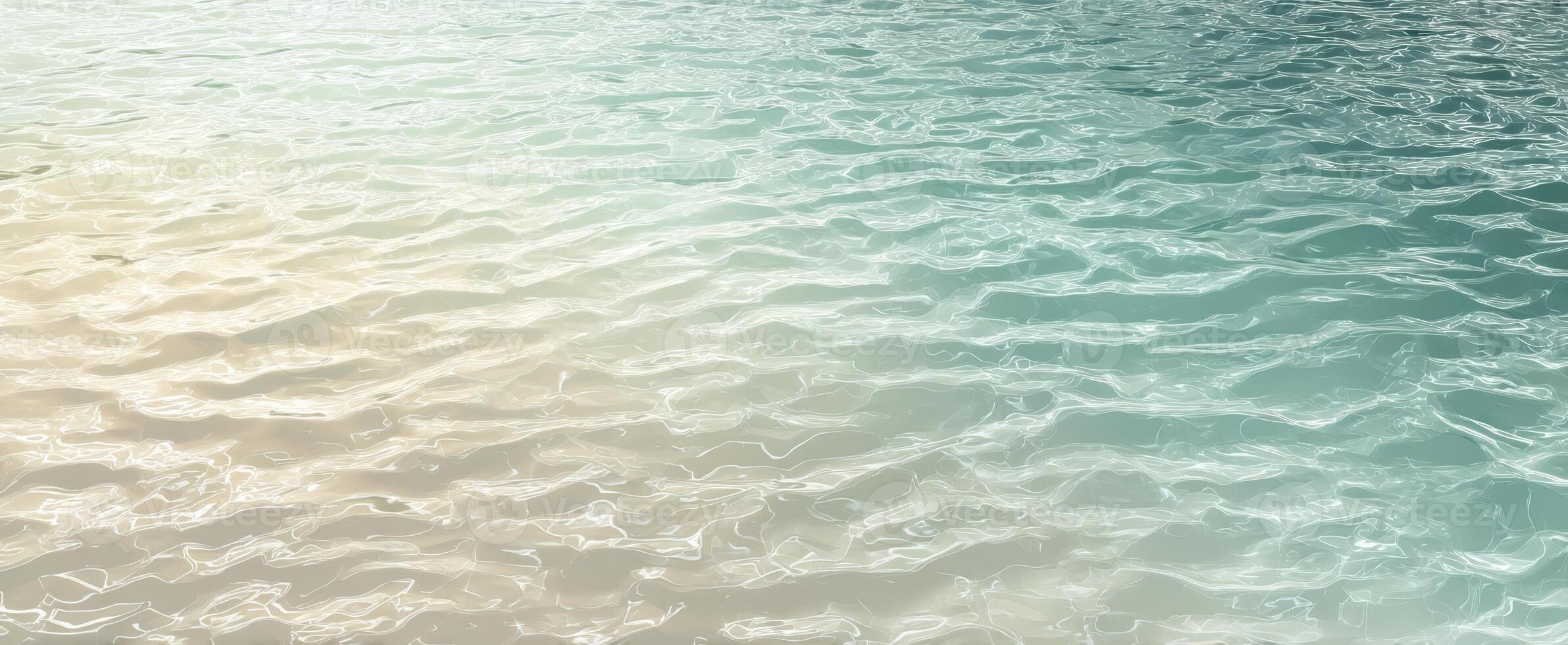The gentle waves of a tranquil ocean surface reflecting sunlight. photo