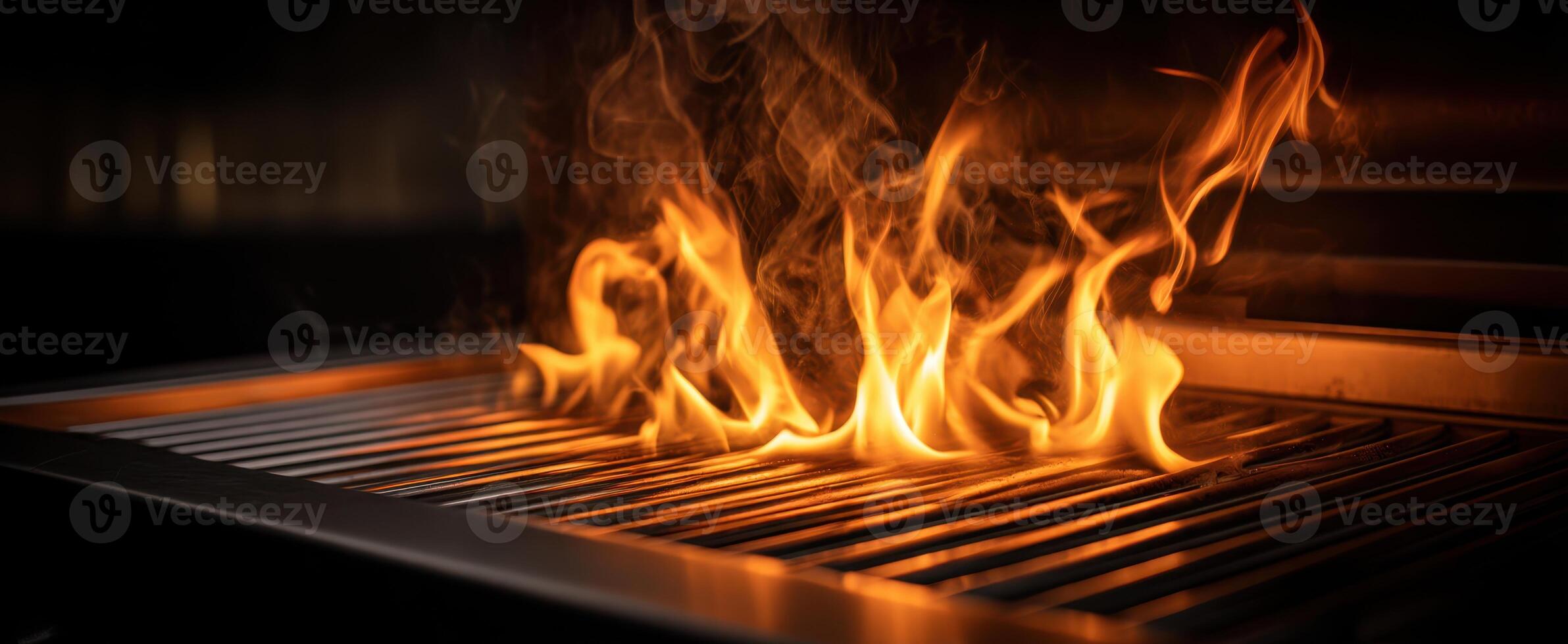 The Flames Erupting from a Grill Ready for Summer Cooking photo