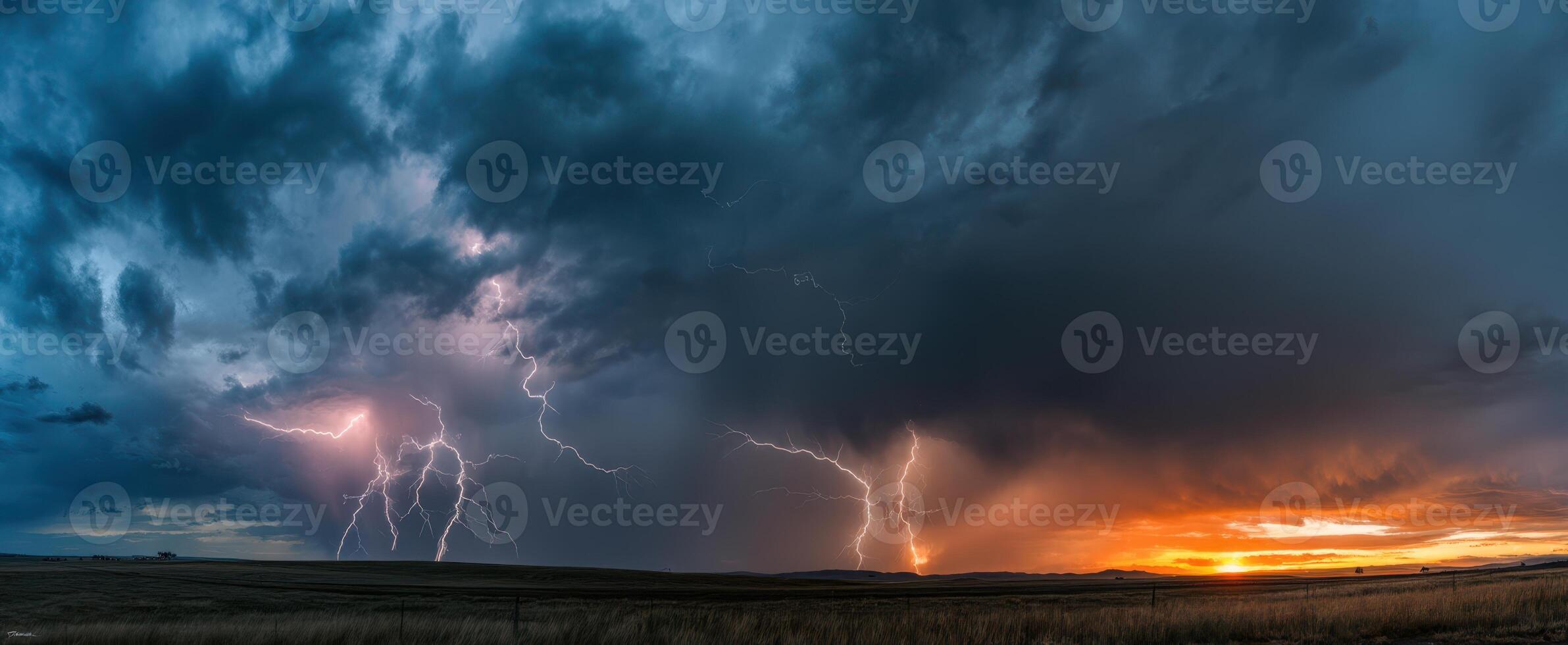 The Dramatic Display of Lightning Against a Colorful Sunset. photo
