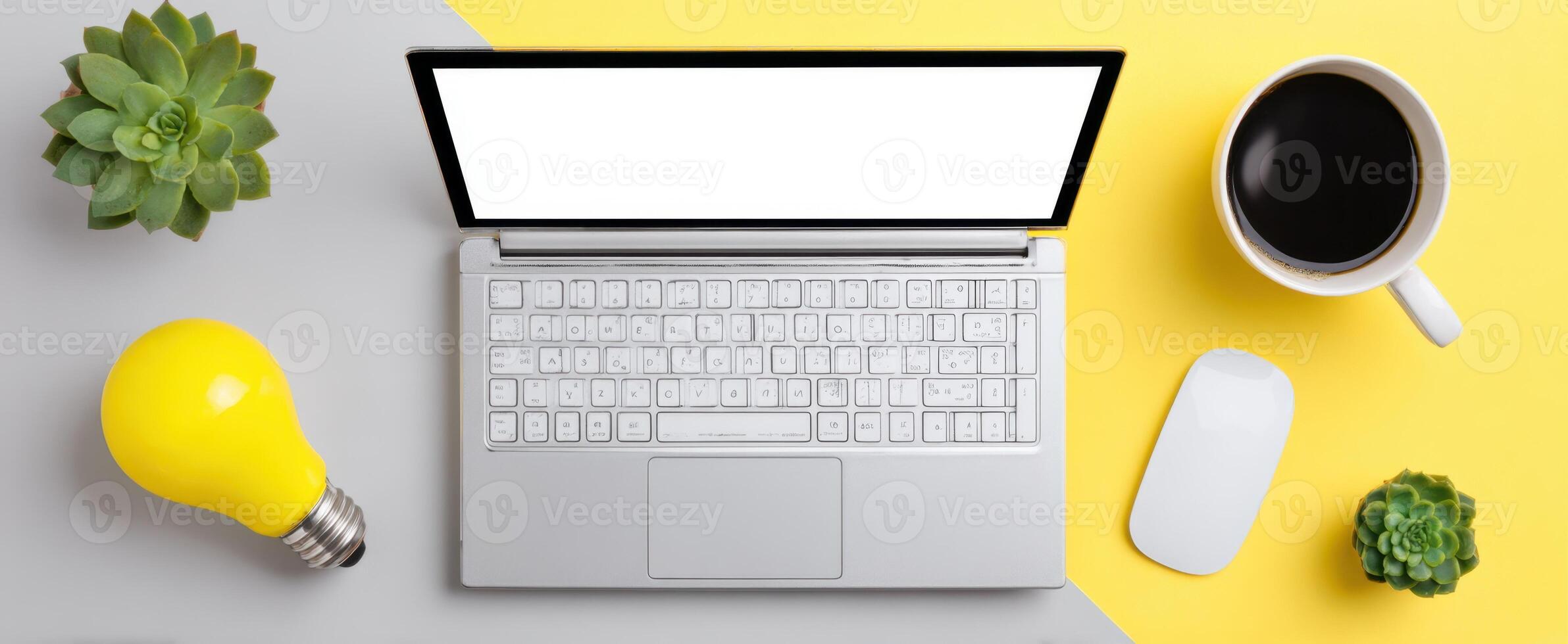 The laptop and coffee cup on a vibrant and creative workspace. photo