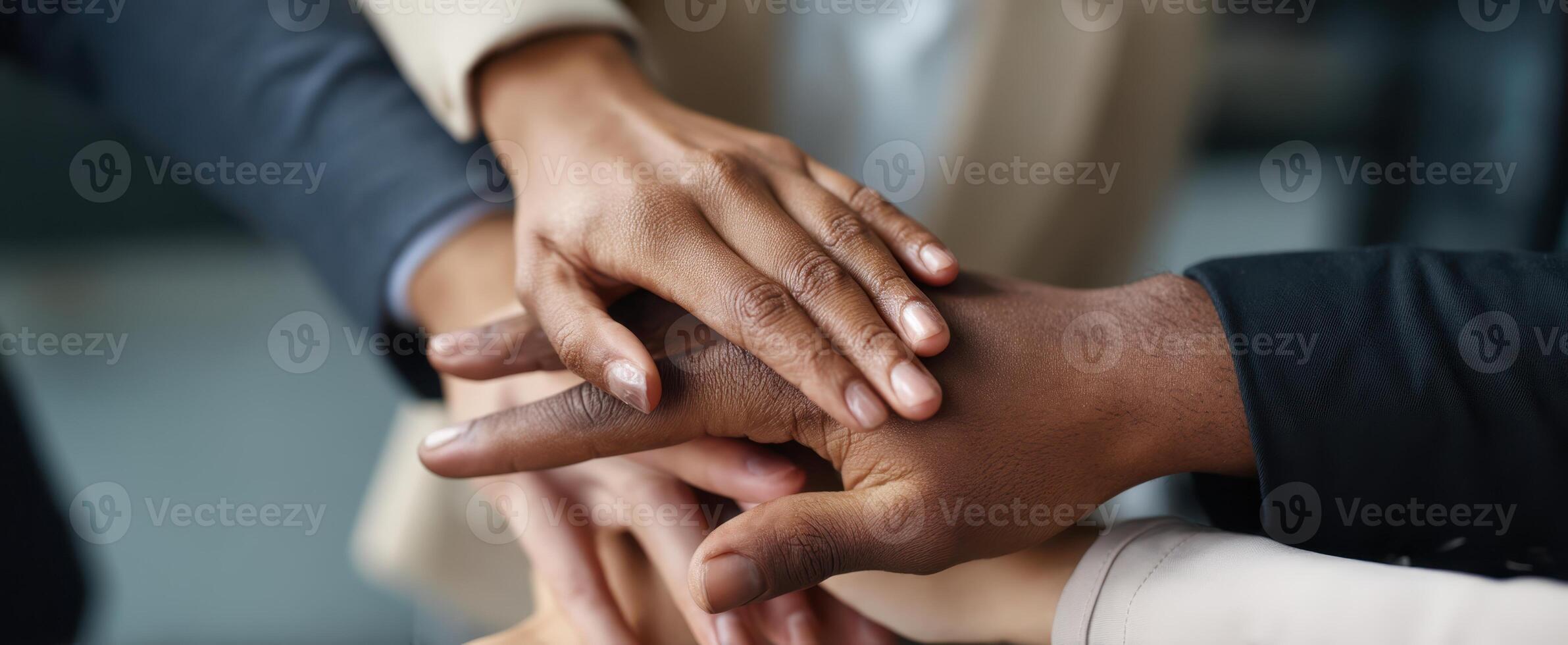 The hands of teamwork symbolize unity and collaboration in a professional setting. photo