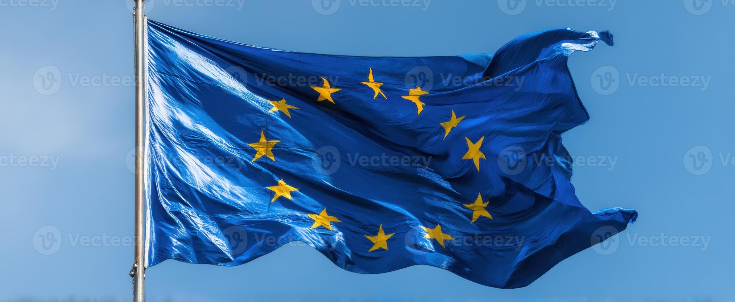 The european union flag is blowing in the wind photo