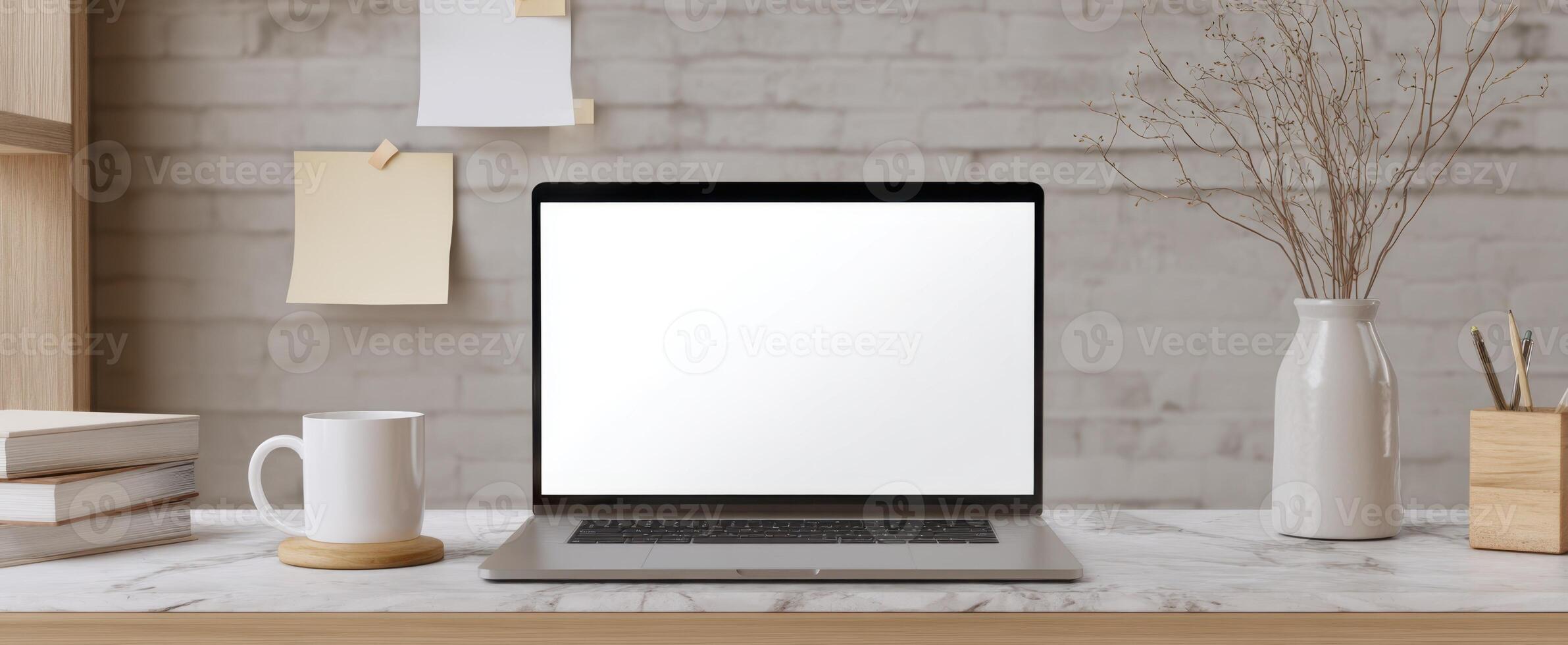 The sleek laptop on a stylish home office desk with minimalistic decor photo