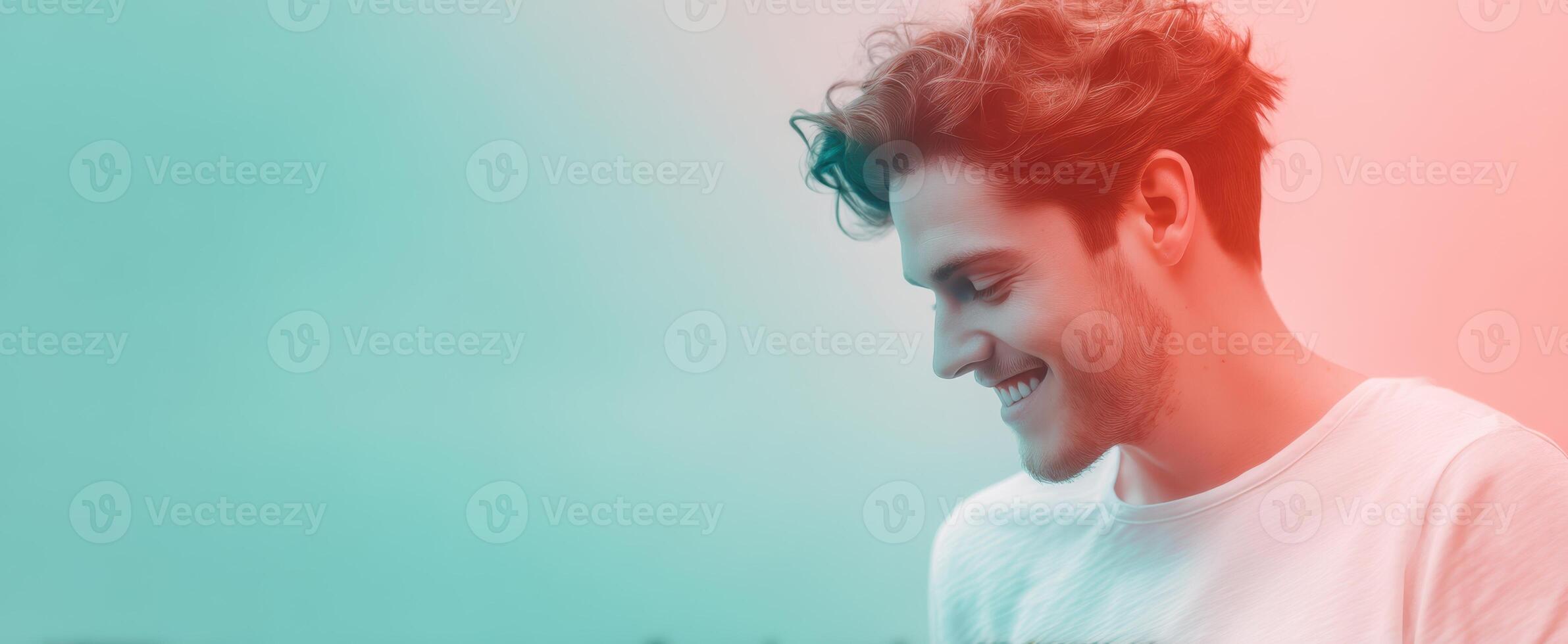 The smiling man enjoying a peaceful moment in a colorful atmosphere. photo