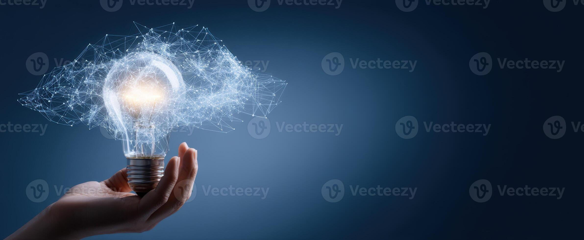 The illuminated lightbulb symbolizes innovative ideas and creativity in technology. photo