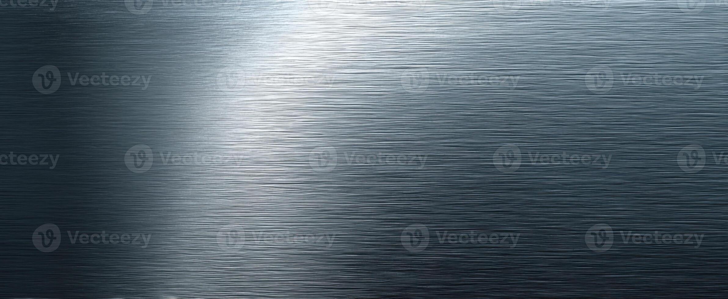 The shimmering metallic surface reflecting light in a unique abstract design photo