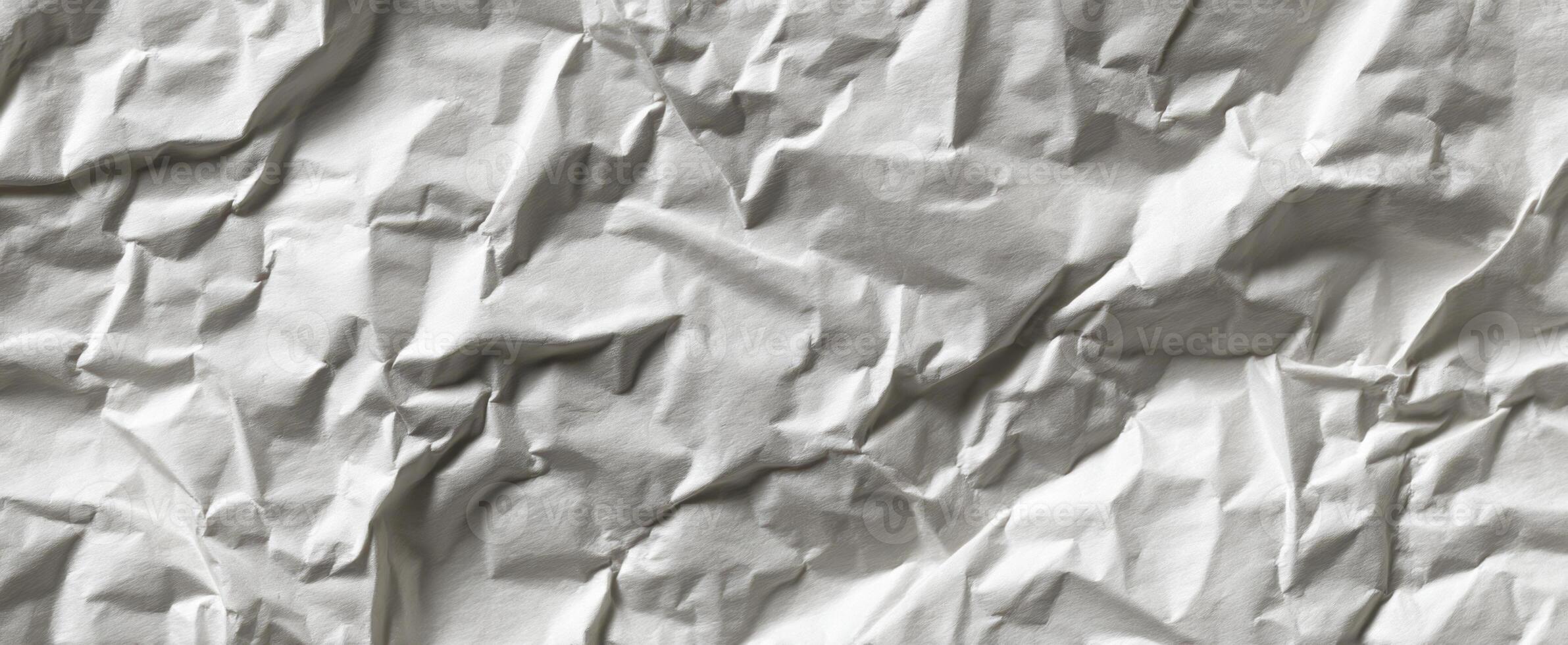The intricate texture of crumpled white paper for creative backgrounds and designs. photo