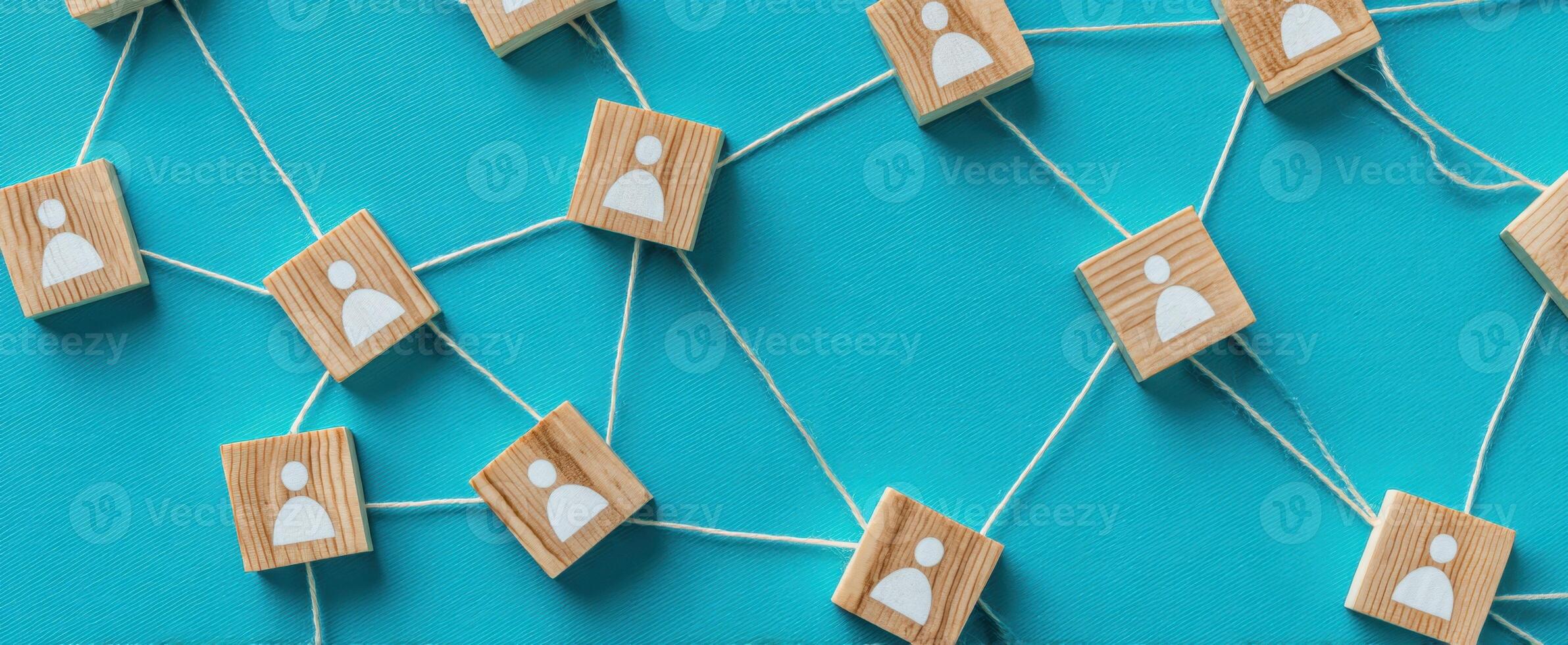 The network connection represented by wooden profile icons on a vibrant background. photo