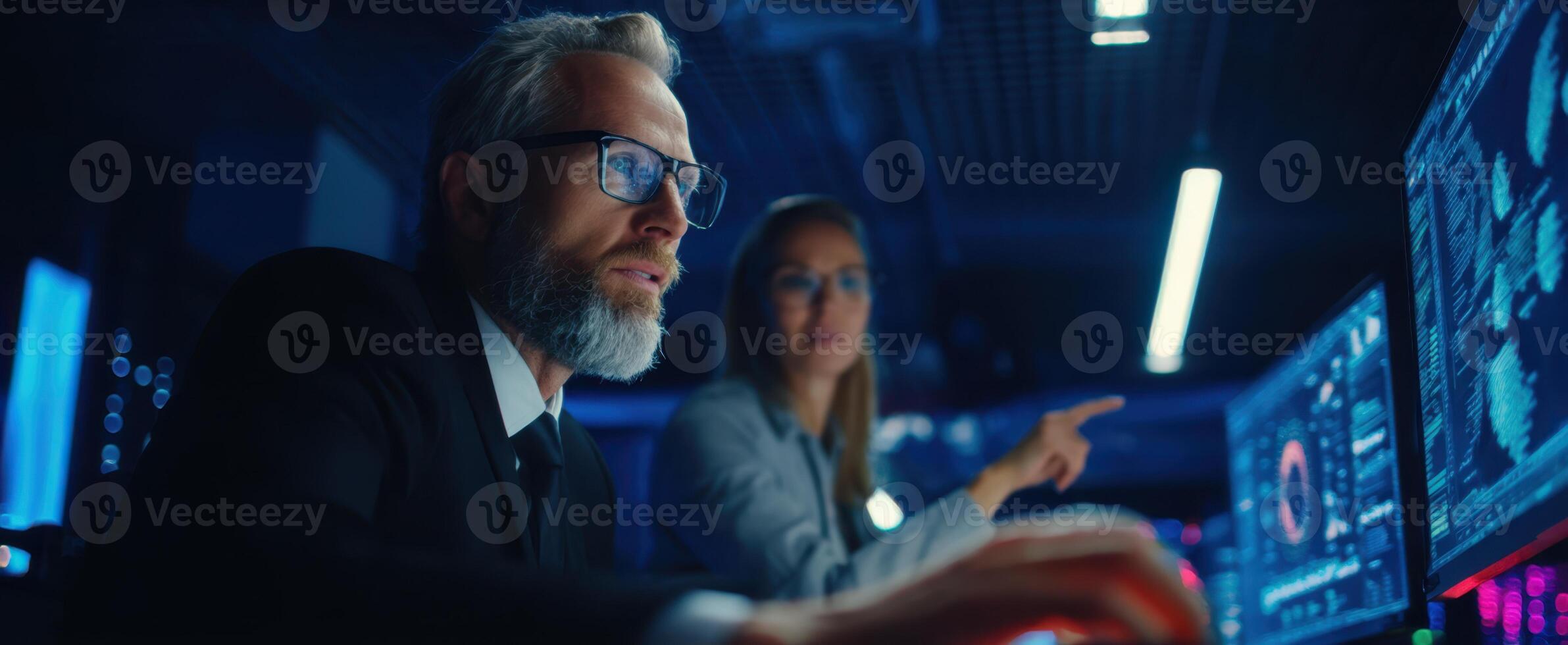 The professional team collaborating in a high-tech office environment. photo