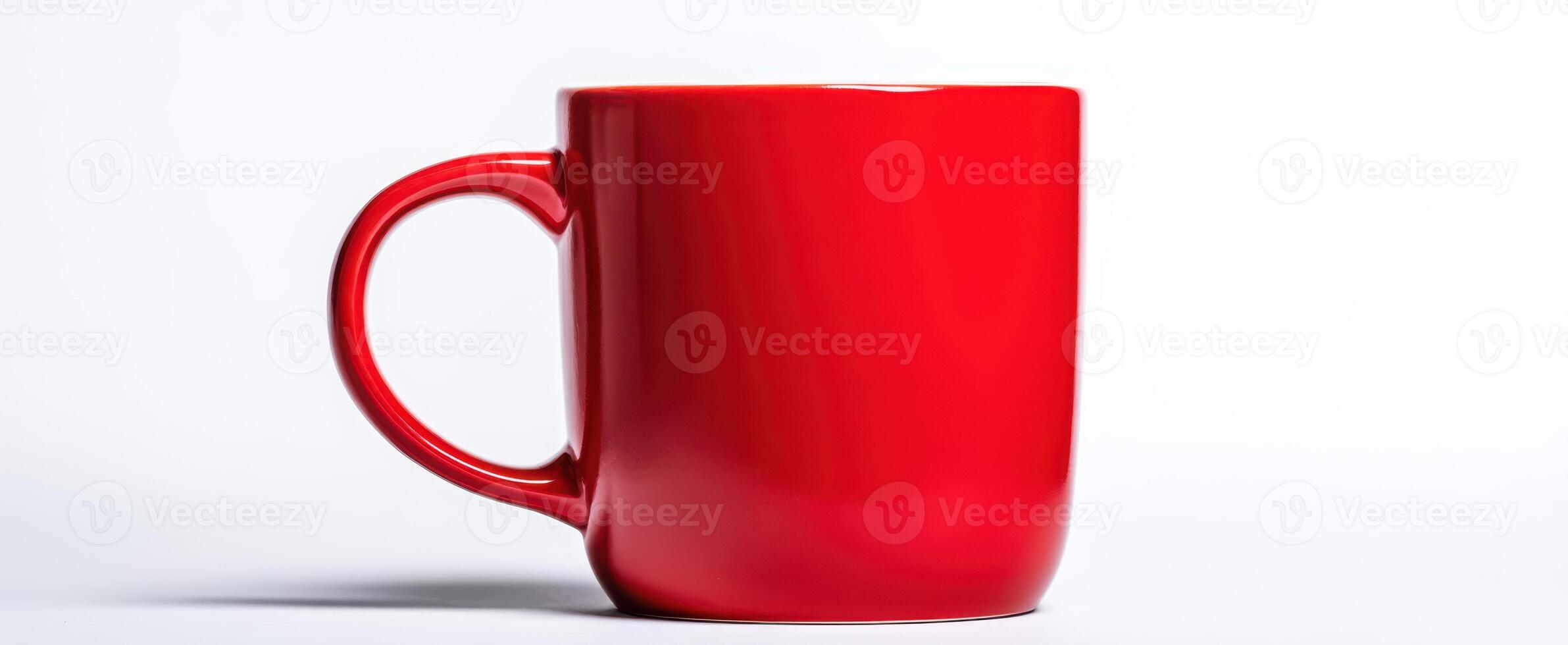 The vibrant red mug standing alone against a clean, minimal background. photo
