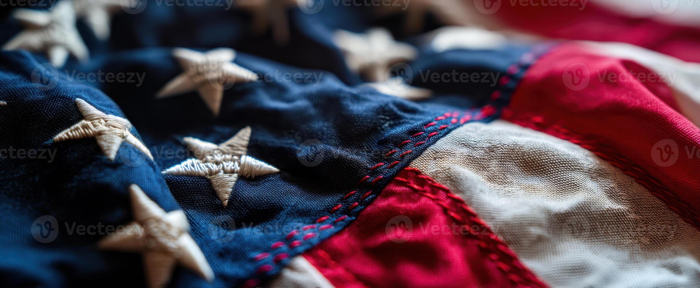 The Close-up View of a Worn American Flag Displaying Its Rich Textures and Colors. photo
